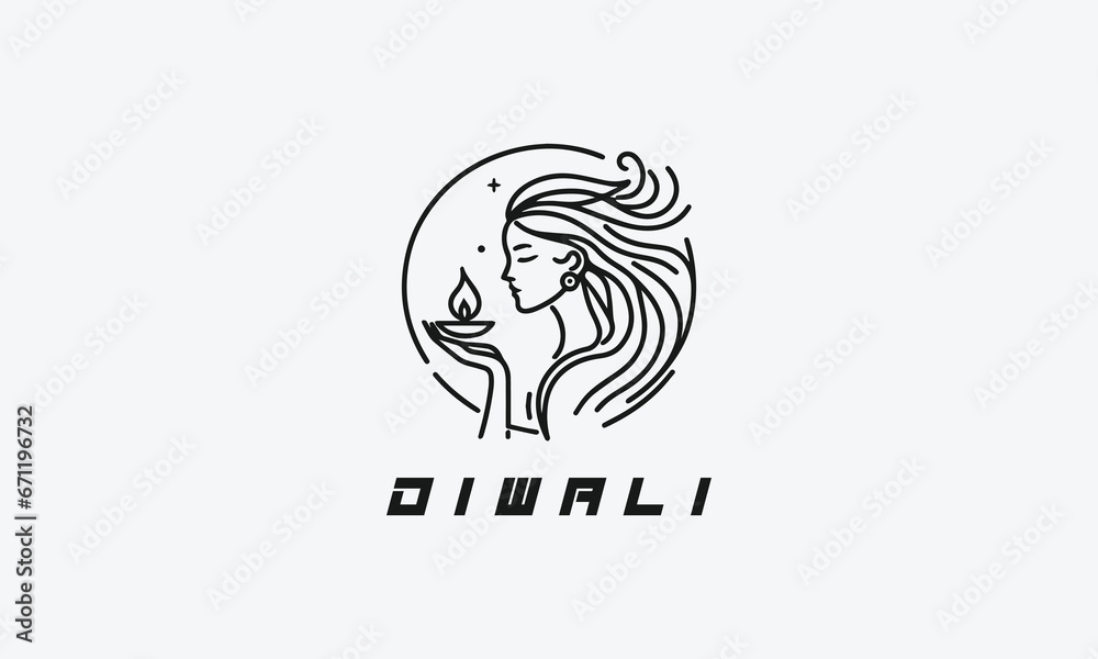 Women in Diwali traditional dress and holding a Diya Women in Diwali traditional dress and holding a Diya