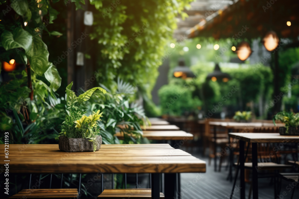 Obraz premium A simple wooden table with a vibrant potted plant on top. This image can be used to add a touch of nature and freshness to any interior design concept.