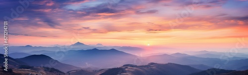 Panoramic View of Mountains at Sunset photo