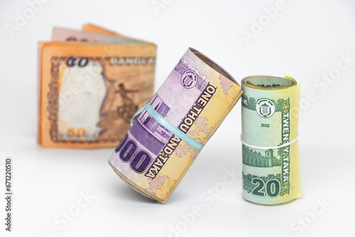 Bangladeshi taka or money bundles banknotes isolated white background ,