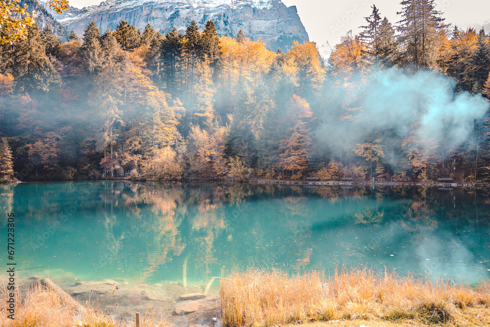 smoke over lake in autumn