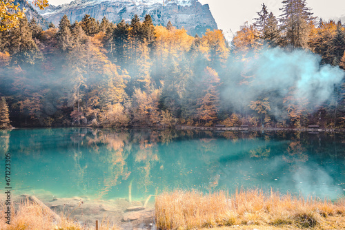smoke over lake in autumn