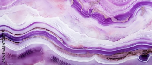 Closeup of polished abstract purple white agate crystal natural quartz healing stone texture background photo