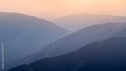 Beautiful layered blue mountains, transitioning into the sunset horizontal © Robaina Photograpahy