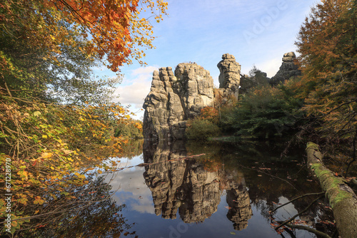 Goldener Oktober im Teutoburger Wald; Blick vom Wiembecke Teich auf die Externsteine photo