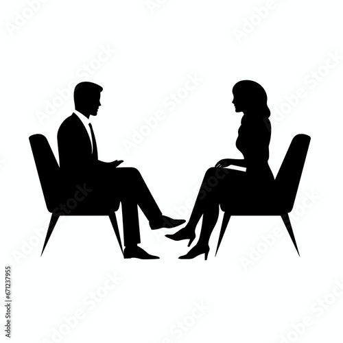 Man and woman sitting on chairs and talking 