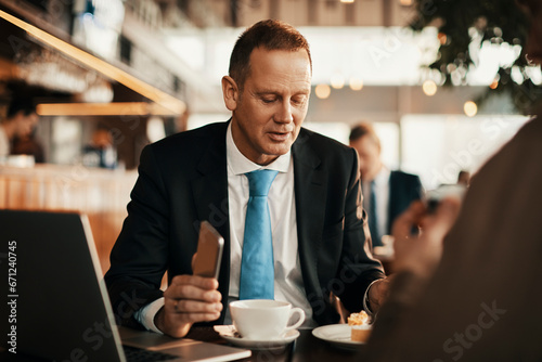 Business partners talking in a coffee shop