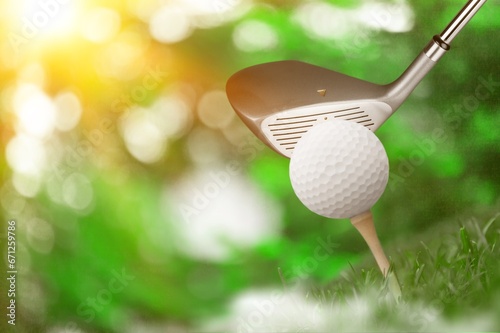 White golf ball on classic sport tee at course.