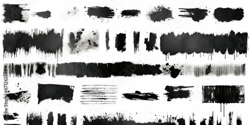 A collection of black paint strokes on a white background. Suitable for artistic projects and graphic design needs. photo