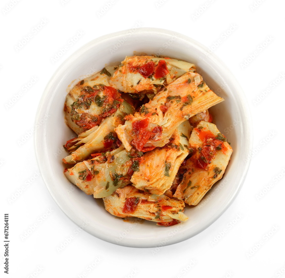 artichokes salad with vegetable mix sauce dressing in a bowl isolated on white background.