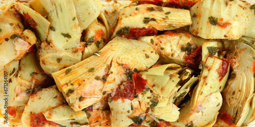Fotografie artichokes salad with vegetable mix sauce dressing background.