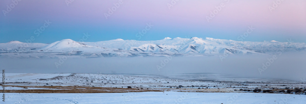 snowy landscape with mountain