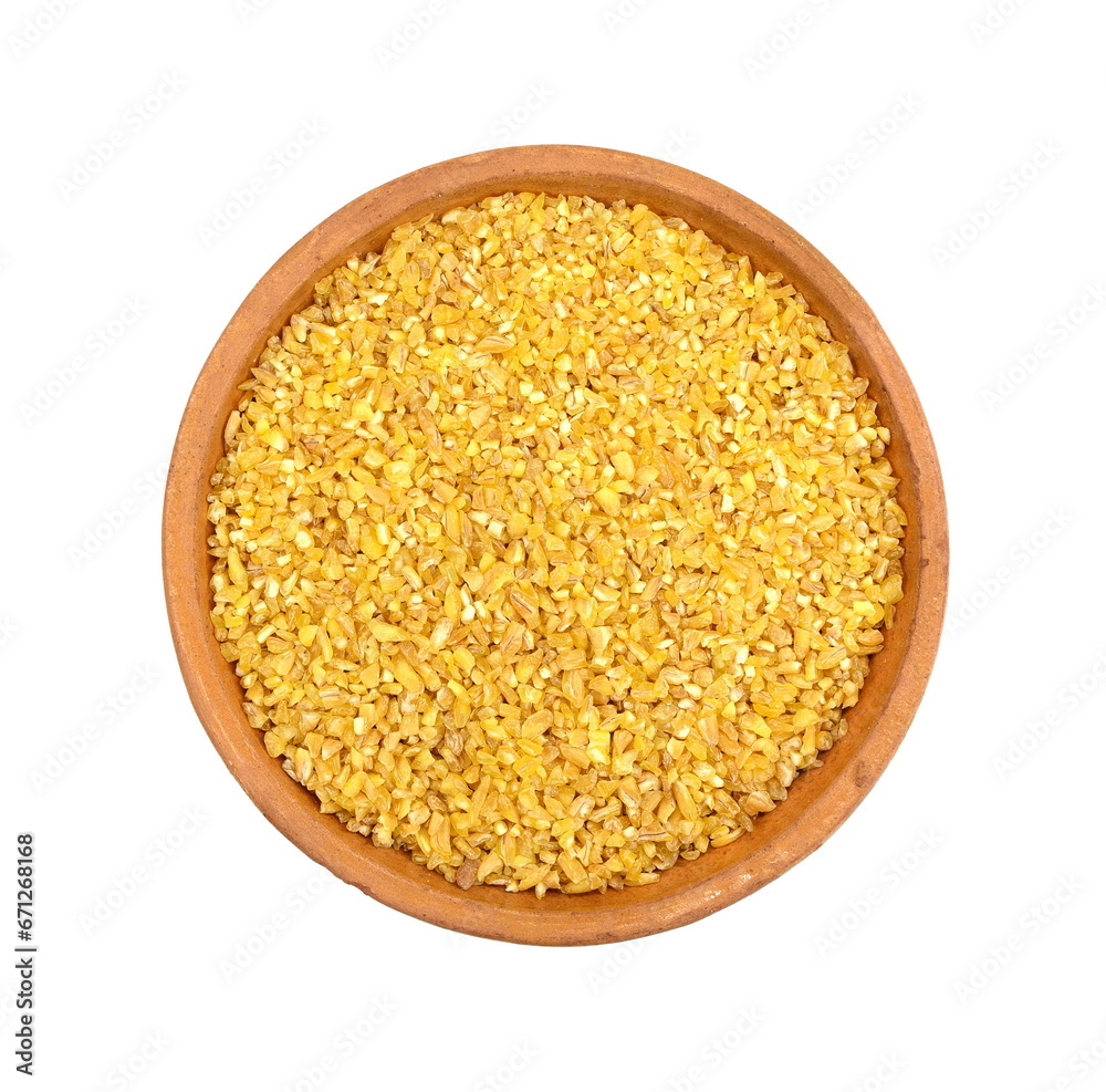 Raw Bulgur in a bowl Isolated on a white background. Raw bulghur, dry cracked parboiled wheat groats, cereal Raw Bulgur in a bowl Isolated on a white background. Raw bulghur, dry cracked parboiled wheat groats, cereal