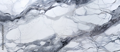 A background made of smooth white marble featuring organic patterns