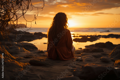 Photograph of a pensive traveler on a beach  watching the stunning spring sunset over the ocean. AI generative