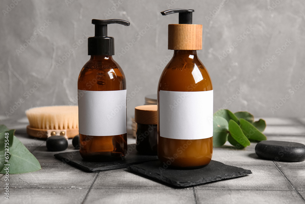 Bottles of shampoo on table Bottles of shampoo on table