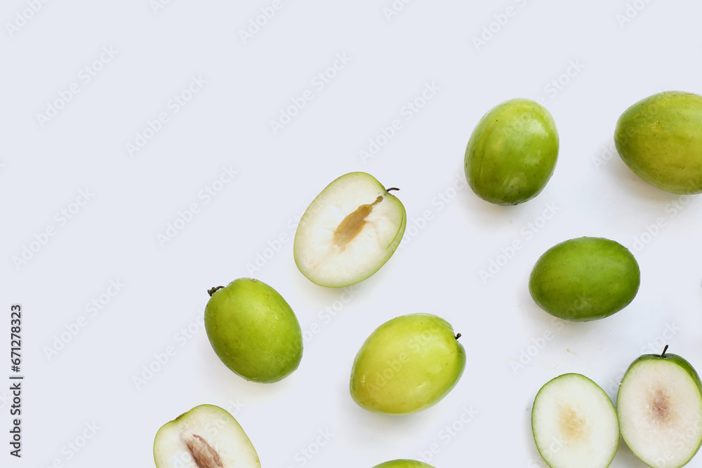 Green jujube fruits on white background. Green jujube fruits on white background.