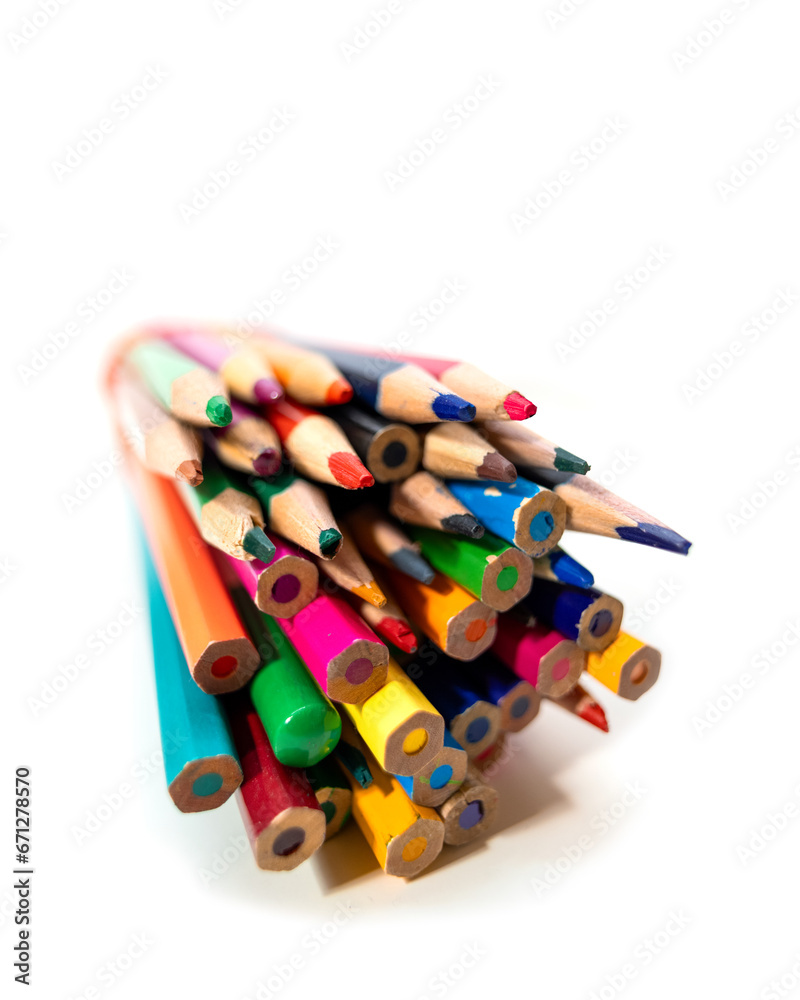 Close up view of stack of colorful pencils on white background. Close up view of stack of colorful pencils on white background.