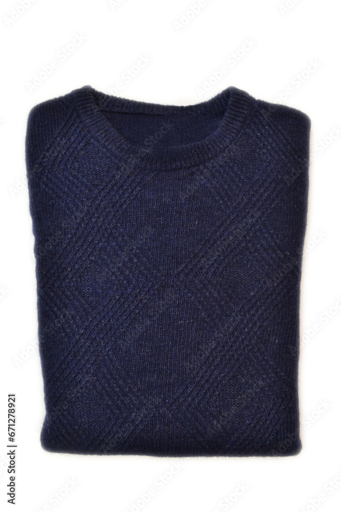 folded blue wool crewneck sweater on white background folded blue wool crewneck sweater on white background