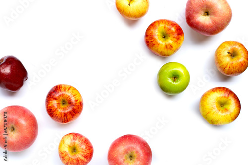 Variety of fresh apples on white background.