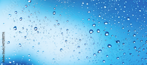 Drops of Water on Blue Background