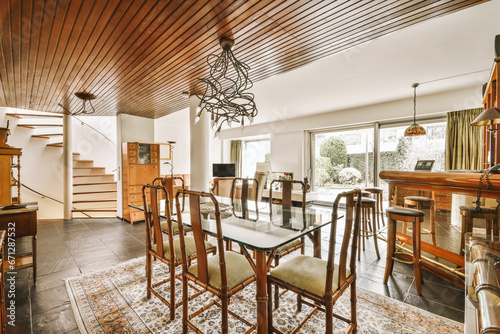 Dining room with glass table and chairs photo