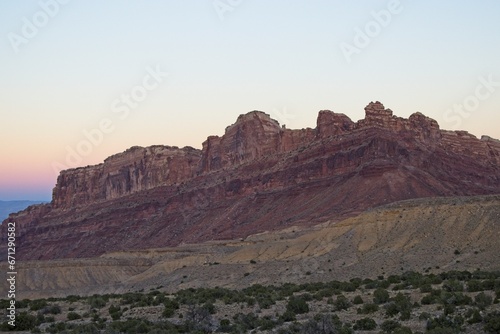 Interstate 70 winds through the San Rafael Swell, a high desert region of unique landforms like mesas and buttes and pastures on top