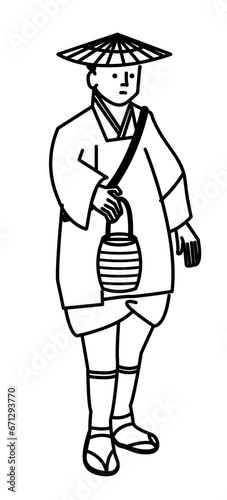 荷物を担いで旅をする江戸時代の男性のイラスト