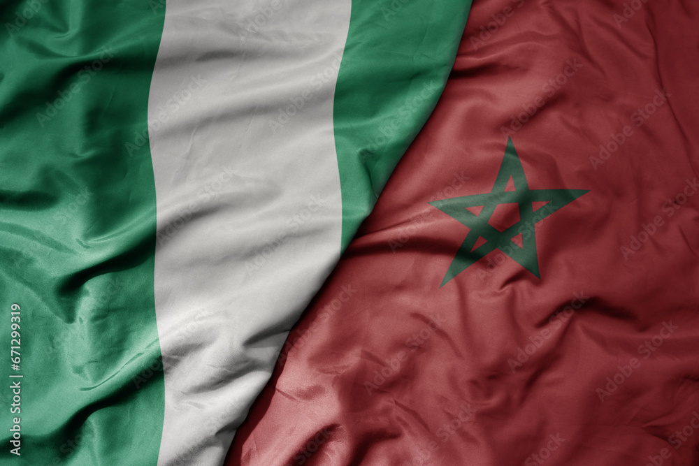 big waving national colorful flag of nigeria and national flag of morocco . big waving national colorful flag of nigeria and national flag of morocco .