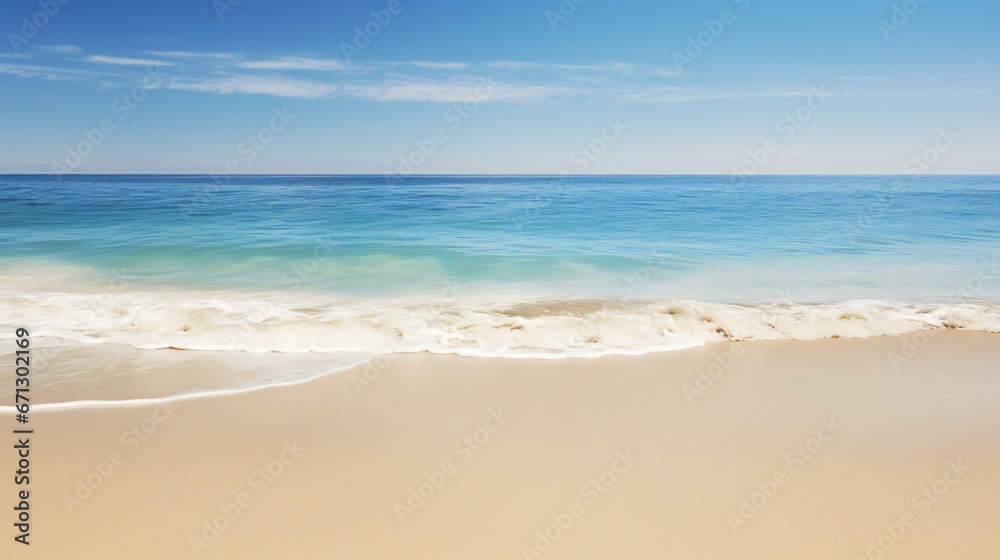 the ocean and sand on a sunny day