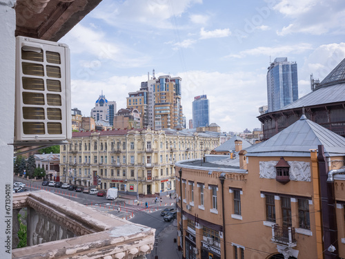 historical and modern buildings seen from the terrace of apartment in capital kyiv