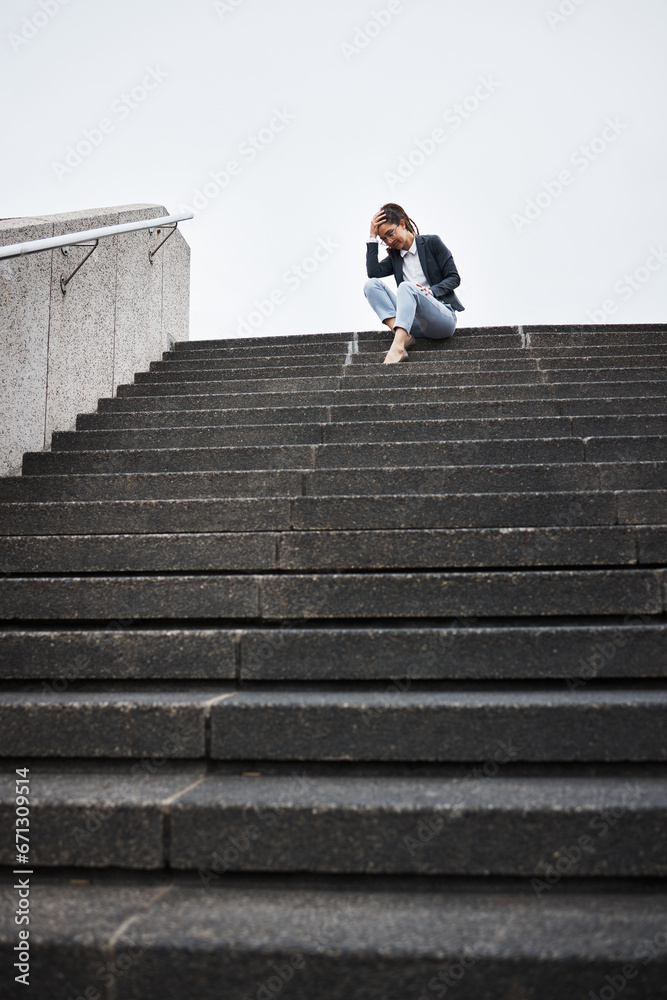 Depression, stairs and business with woman in city for unemployment, job loss and sad. Problem, stress and fear with female employee thinking in outdoors for mental health, frustrated and failure