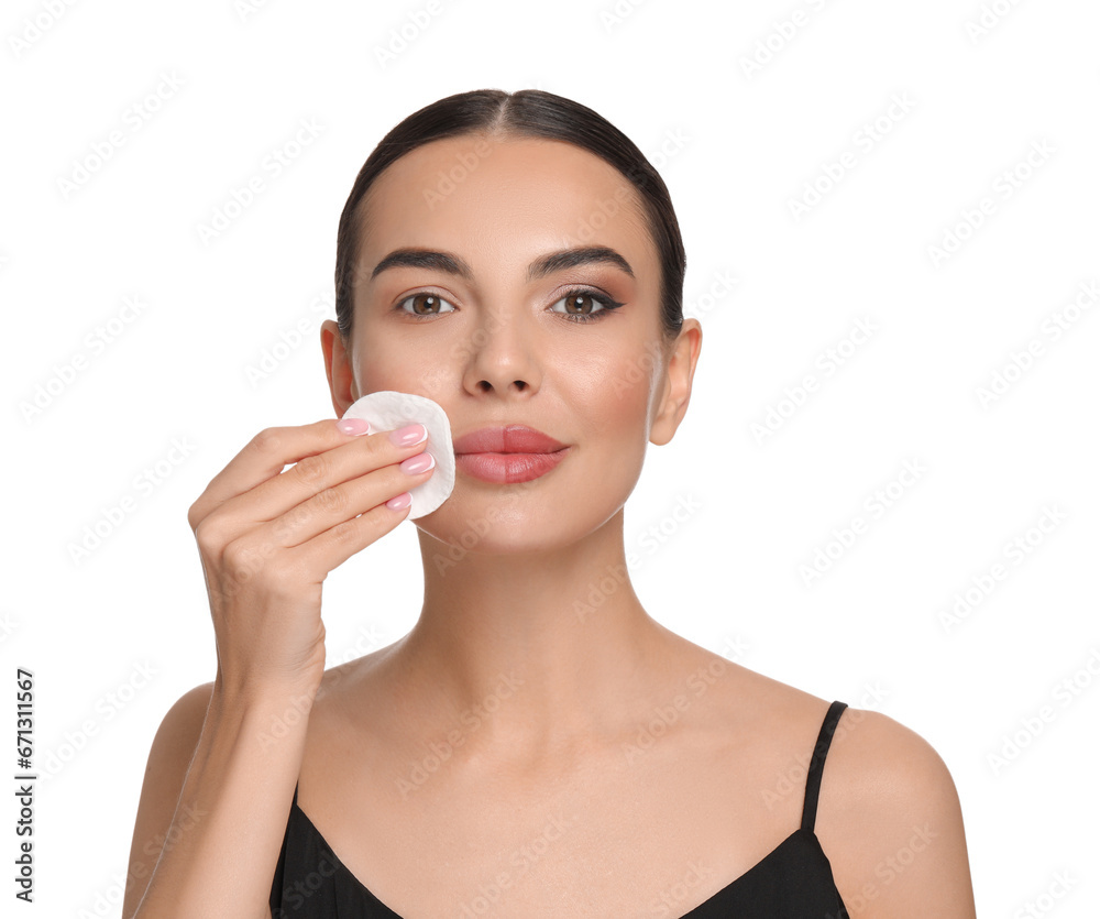 Beautiful woman removing makeup with cotton pad on white background Beautiful woman removing makeup with cotton pad on white background