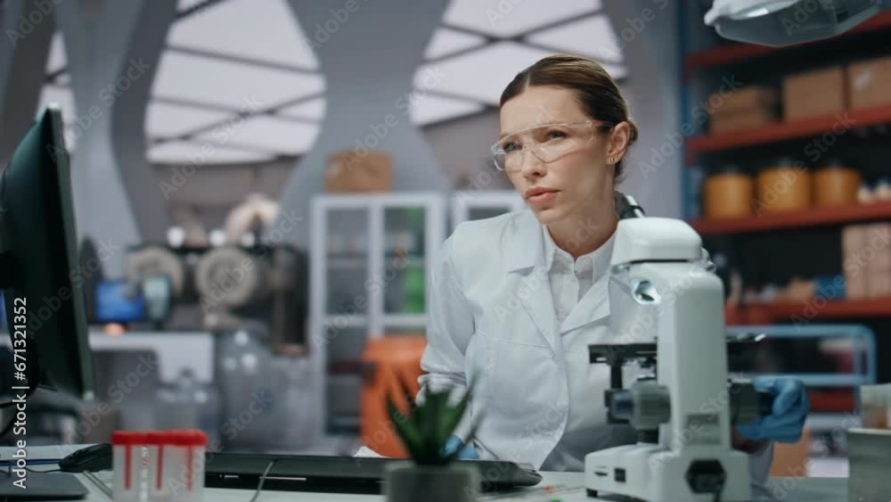 Medical researcher developing project in modern clinical laboratory closeup. Medical researcher developing project in modern clinical laboratory closeup.