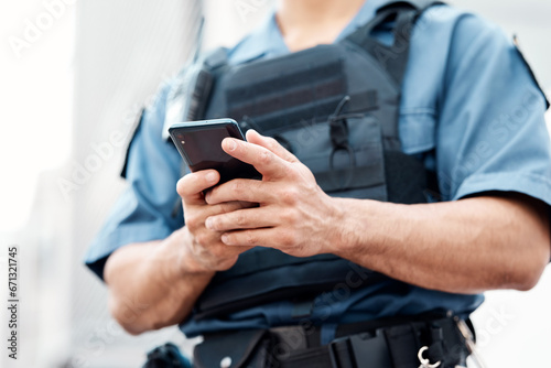 Photography Man, police and hands with phone for networking, communication or social media in the city
