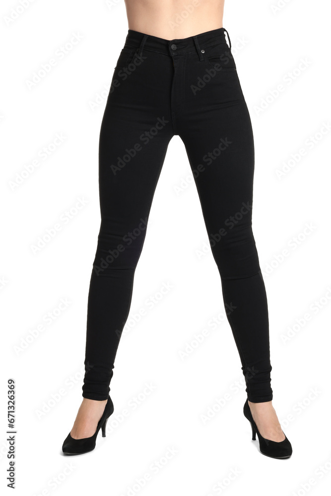 Woman wearing stylish black jeans and high heels shoes on white background, closeup Woman wearing stylish black jeans and high heels shoes on white background, closeup