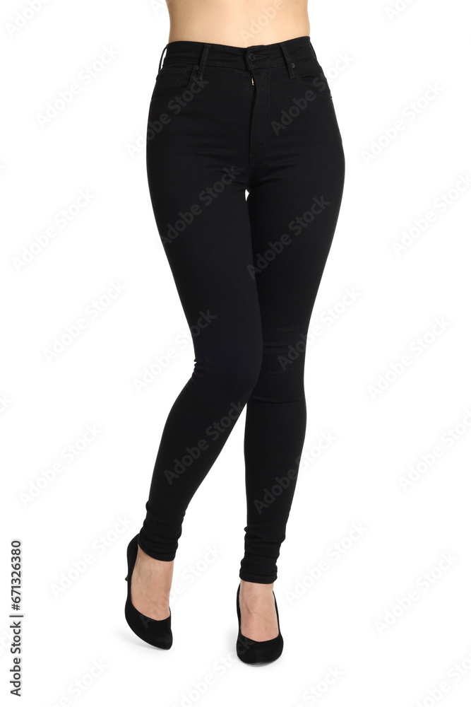 Woman wearing stylish black jeans and high heels shoes on white background, closeup Woman wearing stylish black jeans and high heels shoes on white background, closeup