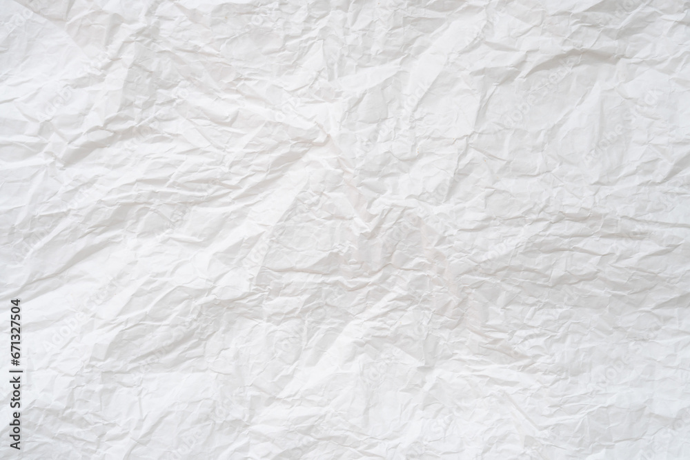 Wrinkled or crumpled white stencil paper used for background texture Wrinkled or crumpled white stencil paper used for background texture