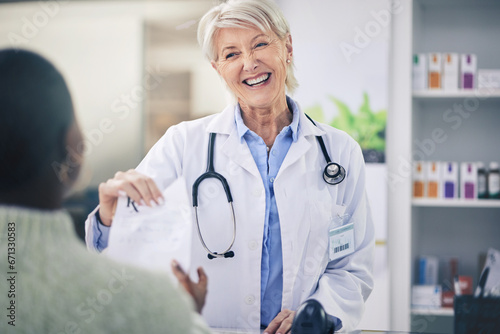 Happy woman, pharmacist and patient for prescription, consultation or quote at the pharmacy. Female person, medical or healthcare professional smile and giving customer doctors note for diagnosis