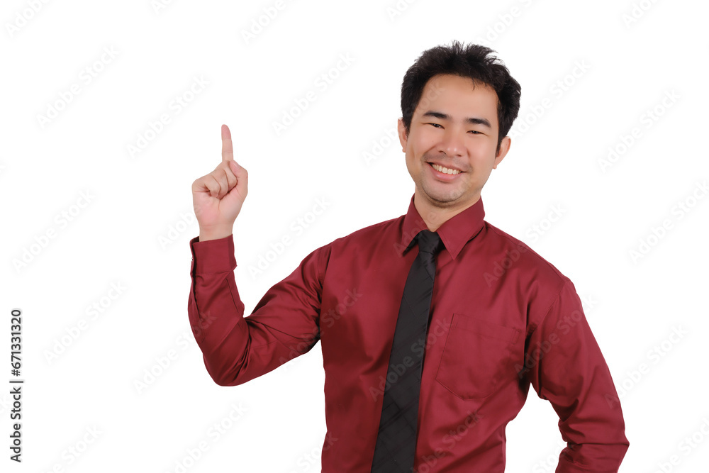 Asian male businessman pointing his finger at empty space, smiling face Asian male businessman pointing his finger at empty space, smiling face