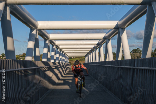 Fototapeta Naklejka Na Ścianę i Meble -  Bike ride on bridge