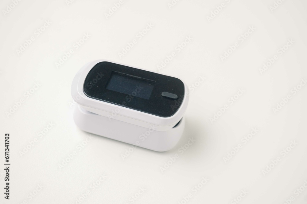 Isometric Pulse Oximeter Fingertip. Blood Oxygen Saturation Level Monitor with Heart Rate Detection, medical device icon, isolated on white background. Isometric Pulse Oximeter Fingertip. Blood Oxygen Saturation Level Monitor with Heart Rate Detection, medical device icon, isolated on white background.