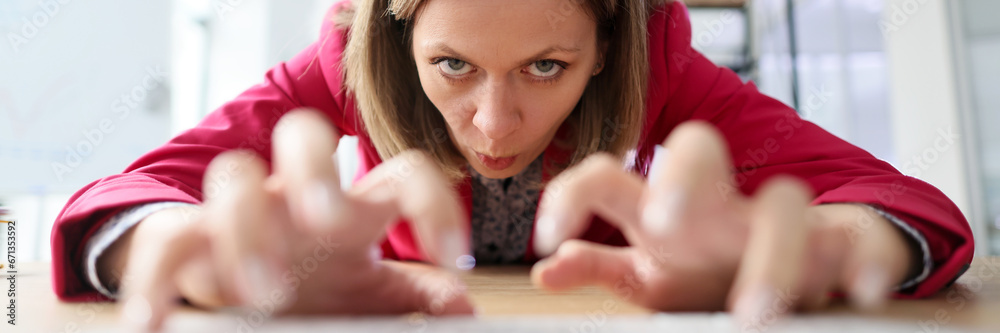 Φωτογραφία Aggressive employee stretches out hands typing on keyboard