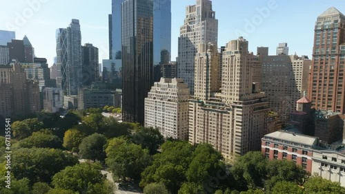 Aerial view backwards away from the skyline of Central park west, in sunny NYC photo