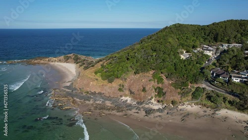 Rugged Landscape At Little Wategos Beach In New South Wales, Australia - aerial drone shot photo