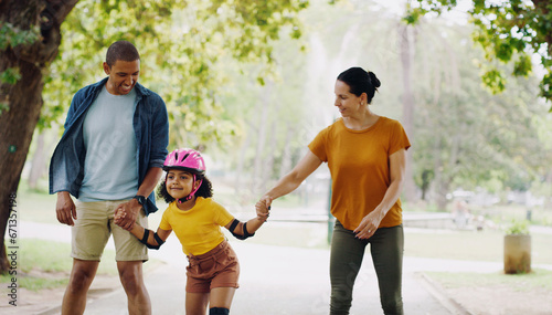 Parents, park and holding hands to rollerskate with girl child with care, learning and support. Interracial family, black man and woman with kid, smile and helping hand for skating on outdoor holiday