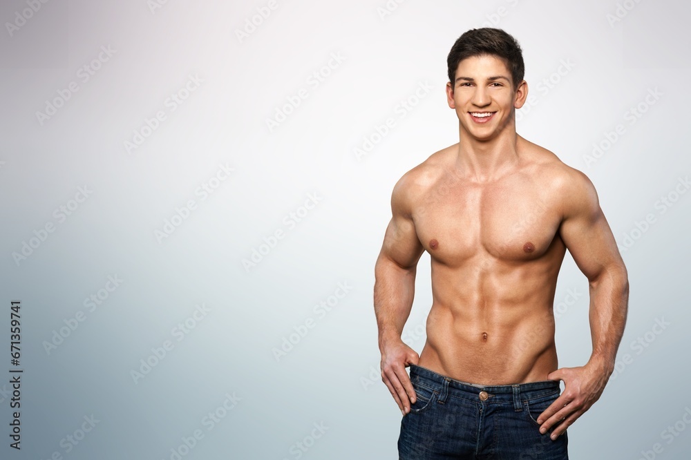 Portrait of happy young man bodybuilder posing Portrait of happy young man bodybuilder posing