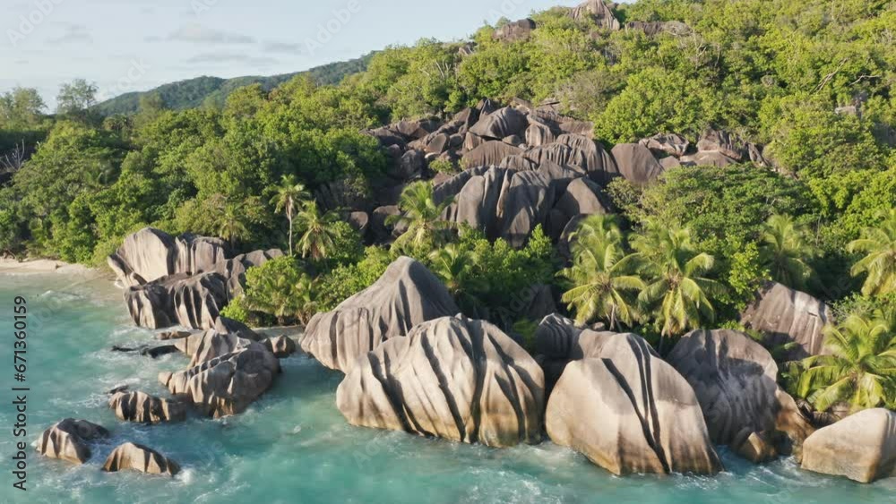 Aerial view of Anse Source d'Argent beach on a sunny day, La Digue island, Seychelles Aerial view of Anse Source d'Argent beach on a sunny day, La Digue island, Seychelles