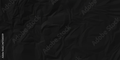 Dark black wrinkled paper crumpled texture. black fabric textured crumpled black paper background. panorama black paper texture background, crumpled pattern texture background. © MdLothfor