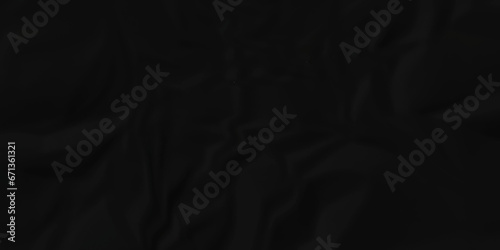 Dark black wrinkled paper crumpled texture. black fabric textured crumpled black paper background. panorama black paper texture background, crumpled pattern texture background.